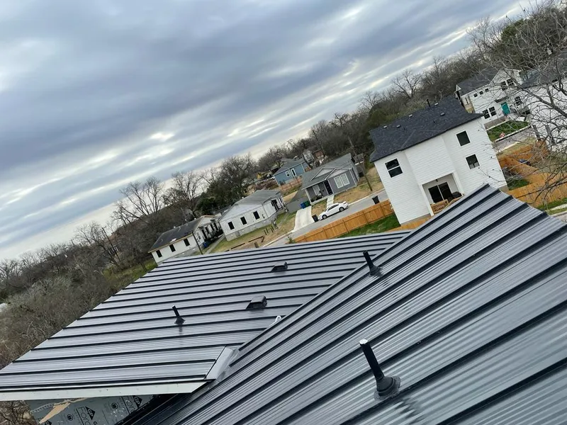 Standing seam metal roof panels with vents for Skylight Repair in Westtown